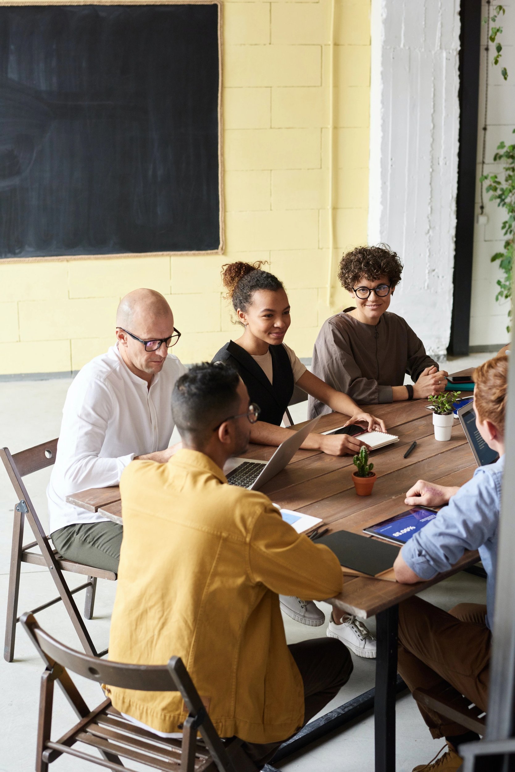 Group of people at the table having a meeting